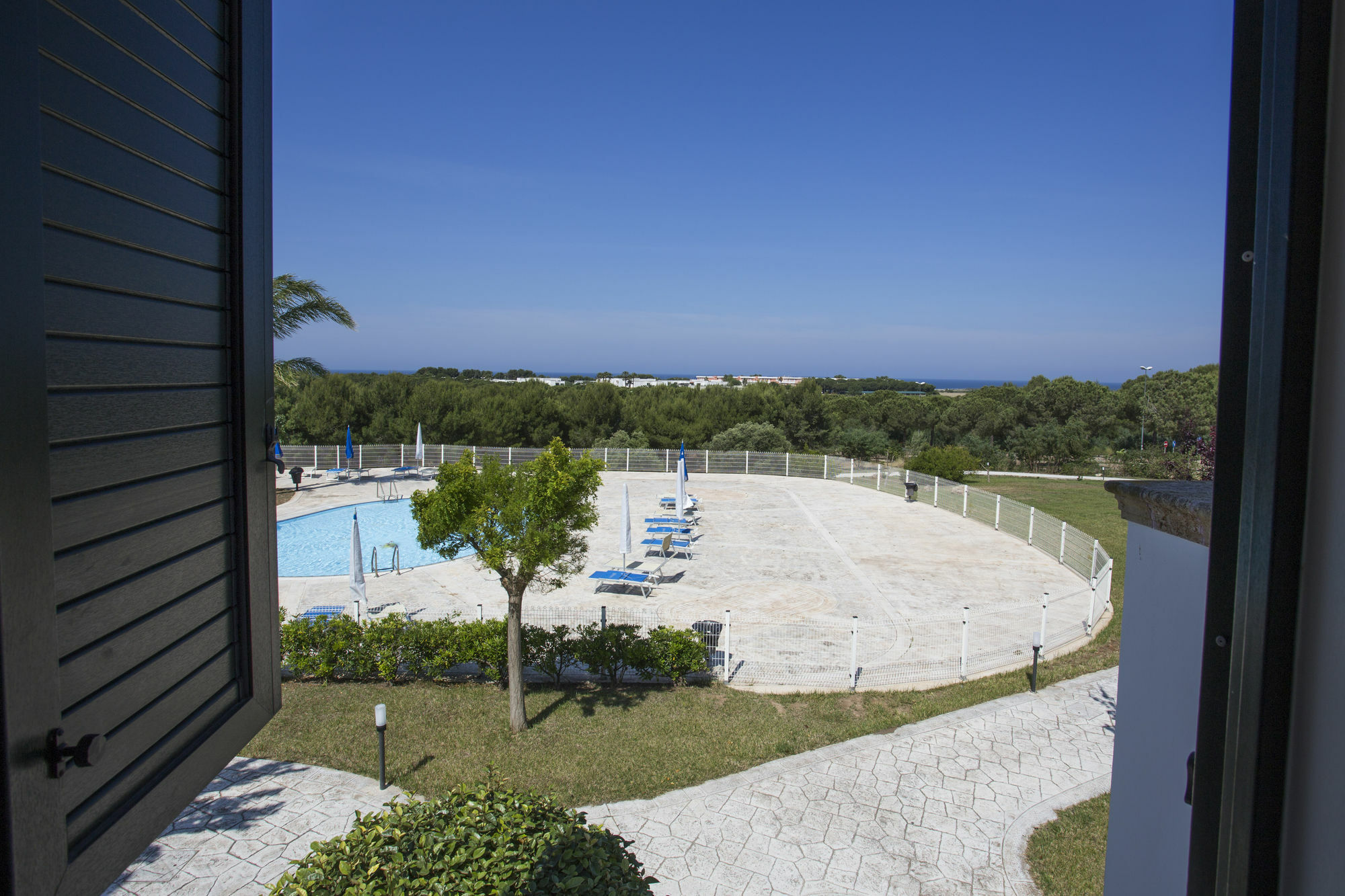 Hotel Resort Portoselvaggio ซันตีซิโดโร ภายนอก รูปภาพ